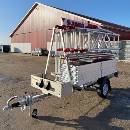 Scaffolding trailer with rolling scaffold